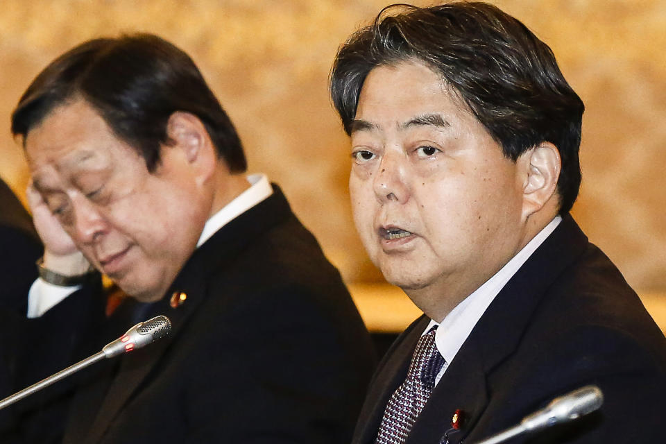 FILE - Japan's Foreign Minister Yoshimasa Hayashi, right, and Defense Minister Yasukazu Hamada, second right, attend a bilateral meeting with Indian coutnerparts in Tokyo on Sept. 8, 2022. Japan and the United States will hold security talks between their foreign and defense ministers in Washington the day before Japanese Prime Minister Fumio Kishida lands in the U.S. capital next week wrapping up his tour of Group of Seven nations as Tokyo expands its military and deepen alliance with America amid China's growing influence.(Rodrigo Reyes Marin/Pool Photo via AP, File)