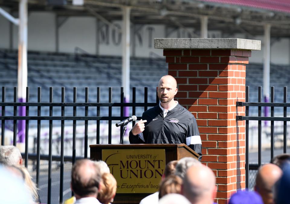 Current Mount Union head football Geoff Dartt during Saturday's ceremony renaming the stadium in honor of former head coach Larry Kehres.
