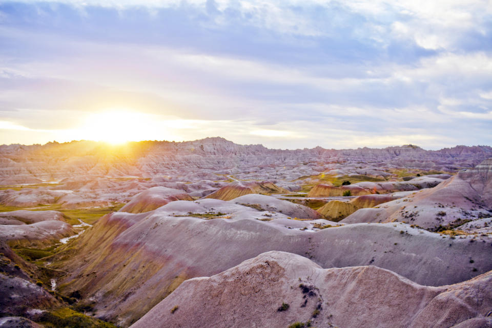 Badlands National Park at sunrise in South Dakota.