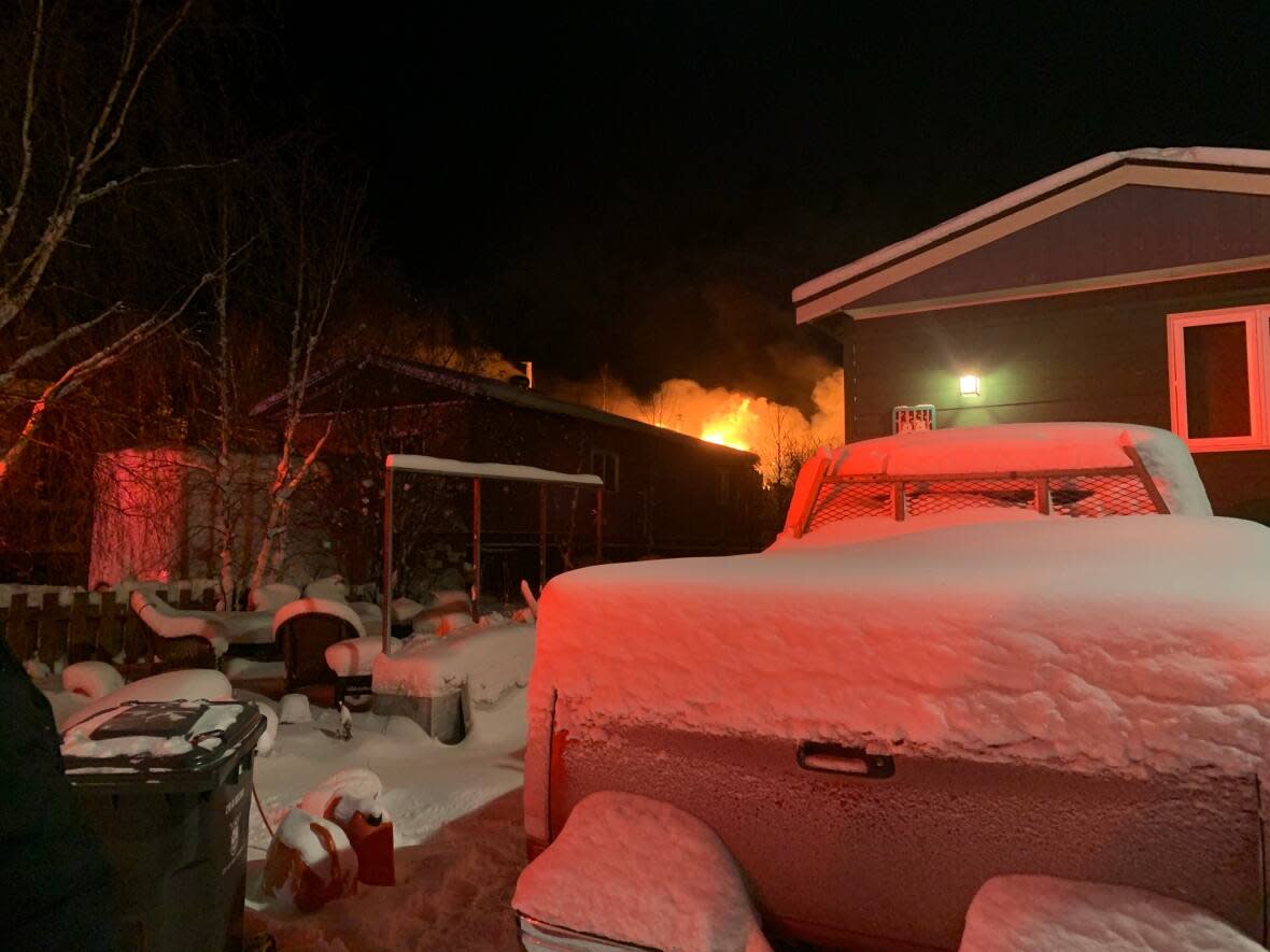 A house in Forrest Park belonging to Yellowknife city councillor Stacie Smith caught fire early Friday morning. No one was injured but Smith lost her dog in the fire. (Andrew Pacey/CBC - image credit)