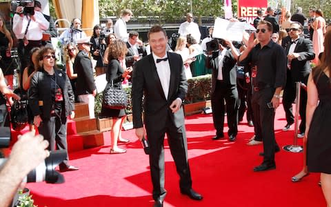 Ryan Seacrest on the Emmys red carpet in 2011: will he get such a warm reception at the Oscars? - Credit: Getty