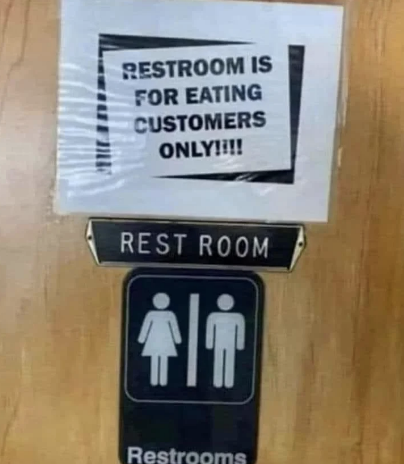 Sign states "RESTROOM IS FOR EATING CUSTOMERS ONLY," above a standard restroom sign with male and female symbols