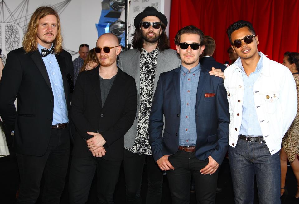 The group The Temper Trap arrive for the Australian music industry Aria Awards in Sydney, Thursday, Nov. 29, 2012. (AP Photo/Rick Rycroft)