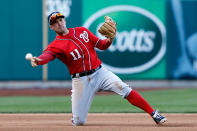 Ryan Zimmerman #11 of the Washington Nationals throws out David Freese #23 of the St. Louis Cardinals at first base in the fourth inning during Game Two of the National League Division Series at Busch Stadium on October 8, 2012 in St Louis, Missouri. (Photo by Jamie Squire/Getty Images)