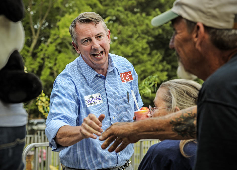 Ed Gillespie, Republican Senatorial candidate, greets voters at the Chesterfield county fair in Richmond, Va., in 2014. (Photo: Bill O’Leary/Washington Post via Getty Images)