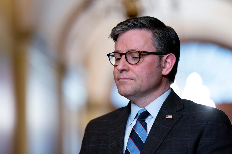 House Speaker Mike Johnson, R-La., stands outside his office during a meeting with the Speaker of the Israeli Knesset, Amir Ohana, at the Capitol in Washington, Tuesday, Feb. 6, 2024.