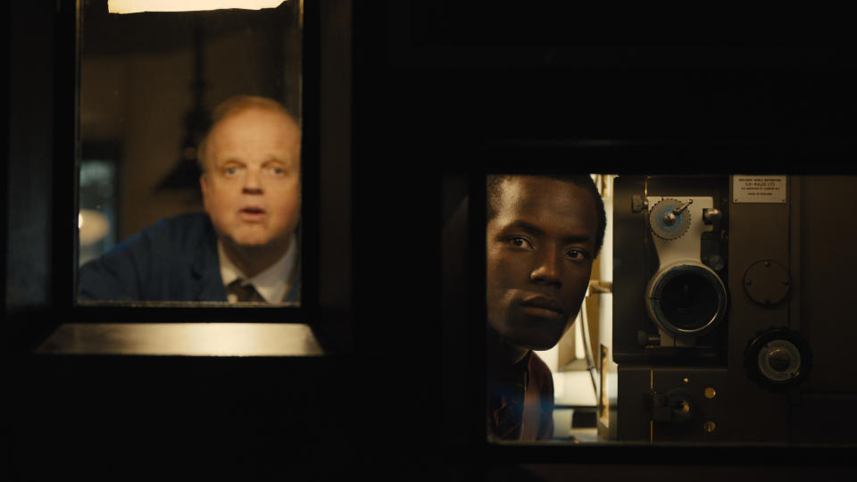 Toby Jones and Micheal Ward play cinema employees in Empire of Light. (Searchlight Pictures)