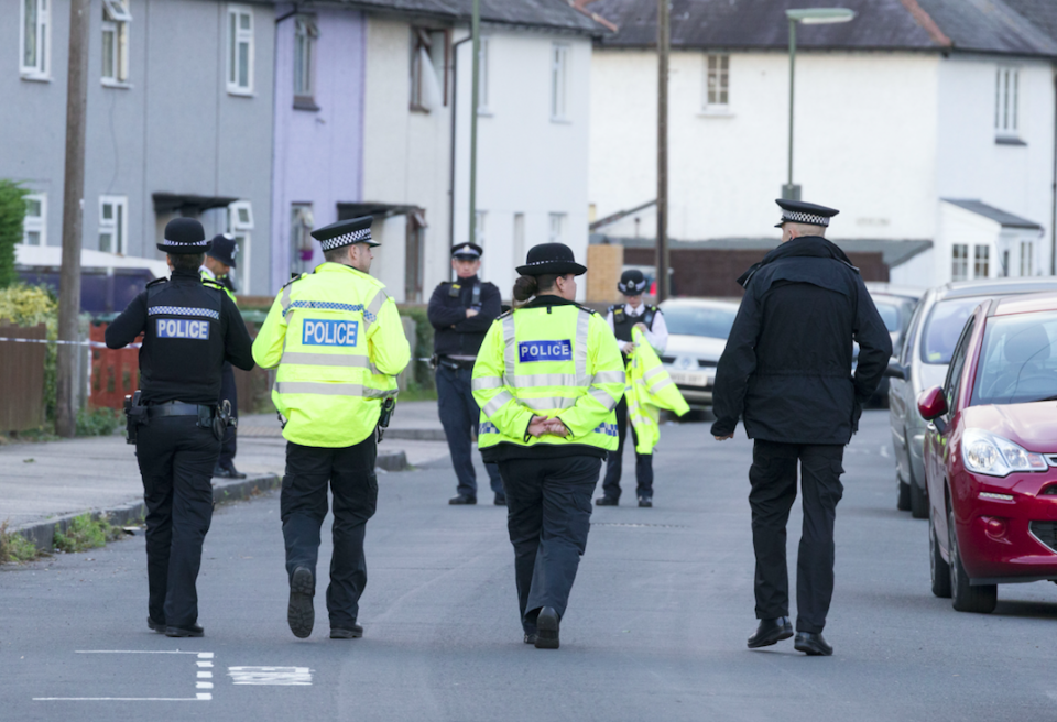 Police closed off an area of Sunbury-on-Thames to search the couple's home (Picture: Rex)