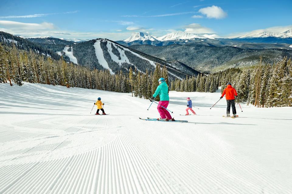 family skiing at keystone