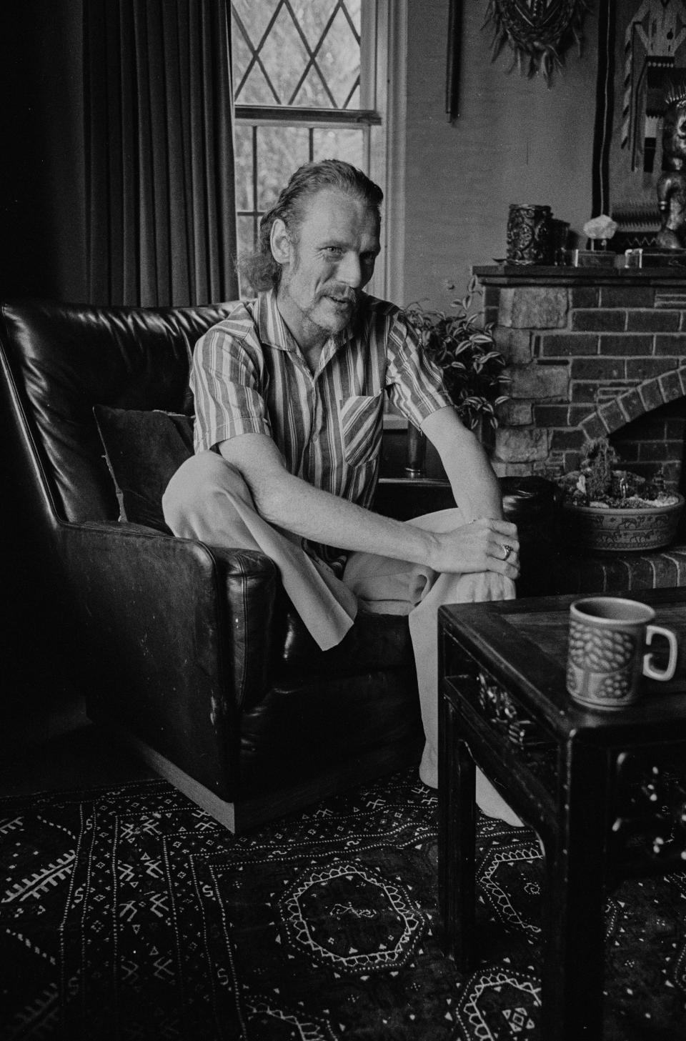 Drummer Ginger Baker relaxing in front of a large bay window, June 1973. (Photo by Clive Barda/Radio Times via Getty Images)