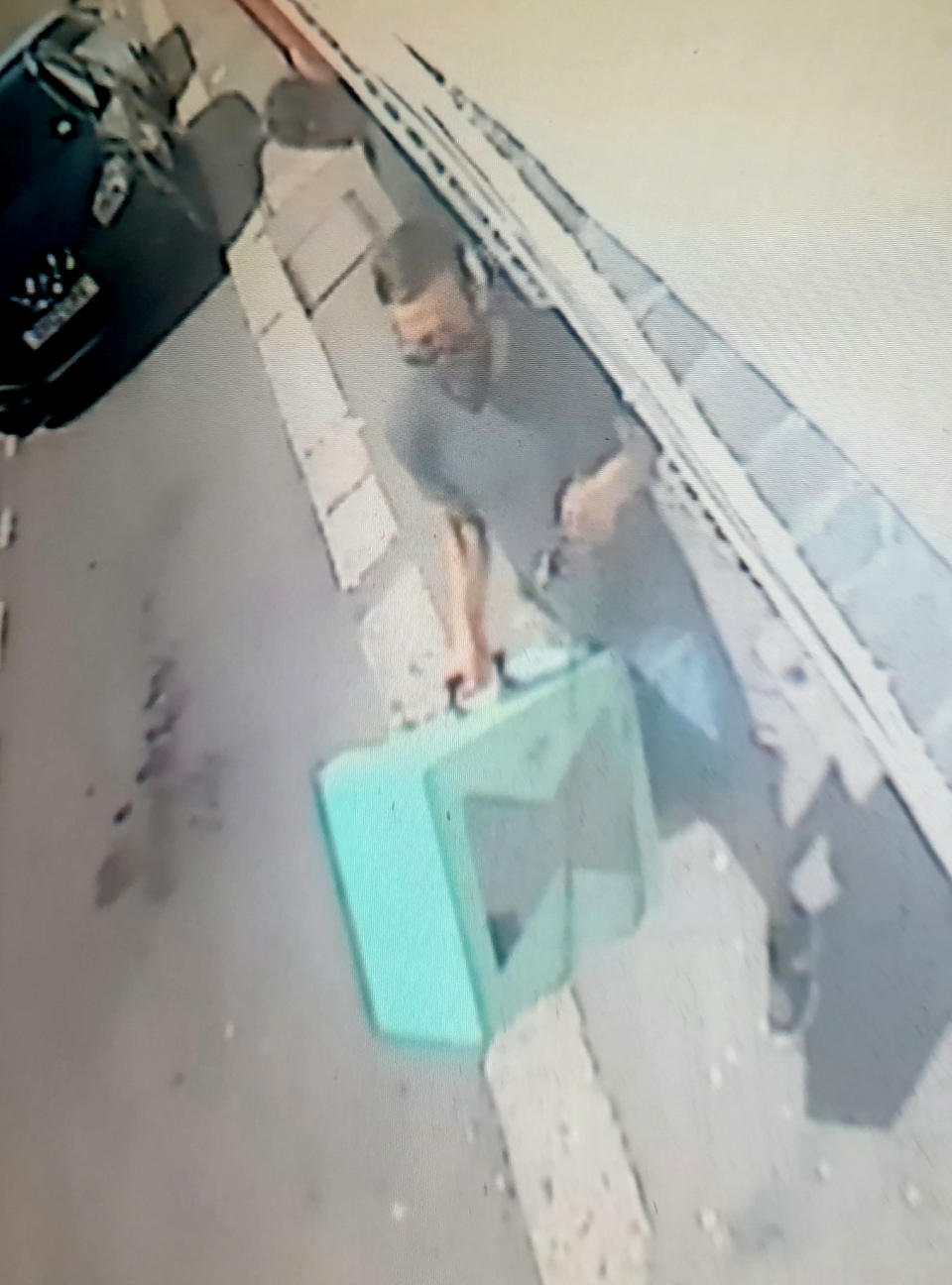 **EMBARGOED UNTIL 2PM BST / JULY 1, 2021**

CCTV of burglar in the pub and removing guitar and other goods to his car outside.  A brazen thief caught on camera stealing £5,000 worth of gear in Dover couldn't be nicked because he had left England by going through customs and was waiting for a ferry to France.  See SWNS story SWNNburglar.  The Italian committed the 'perfect crime' by raiding a pub and driving into a Channel ferry port - a few hundred yards away.  Once there, he couldn't be arrested - by Dover cops or the gendarme - despite being pointed out by the enraged victim.  He was deemed to be on French soil - while the burglary had been committed on British soil.  The bearded suspect, a 31 year old called Luca is understood to have arrived safely home in Italy.  Publican Jemima Burne, 29, was tipped off about the daylight raid by builders working at the Castle Inn.  He timed it to coincide with his hasty departure. He calmly strolled into the bar helping himself to a rare guitar, an amp and a variety of other goods.  He was caught on CCTV around 1pm on June 9 loading his swag into a dark blue Peugeot - and made off. But furious Jemima tracked him down - into the nearby terminal. 