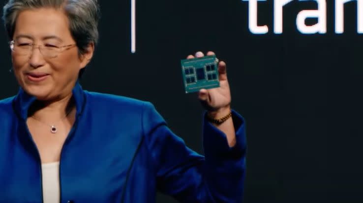  Dr Lisa Su holding a CPU 