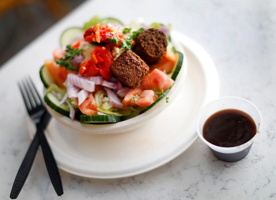 The falafel salad made with chickpeas, hummus and a balsamic vinaigrette dressing at Garden Patch by the Sea on Wollaston Beach.