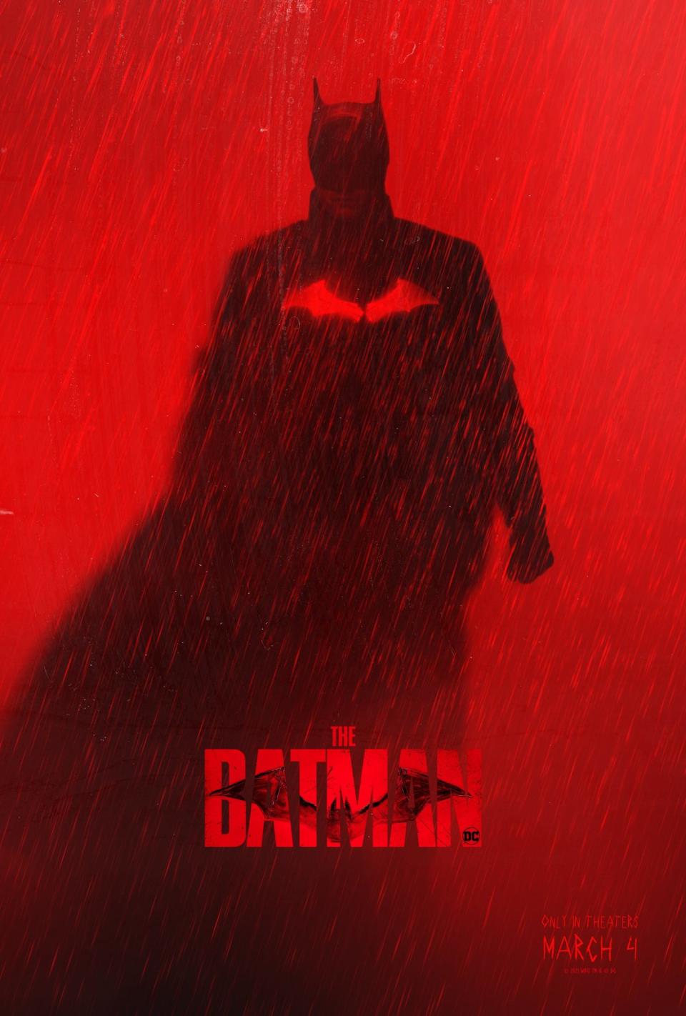 The silhouette of Batman on a red background