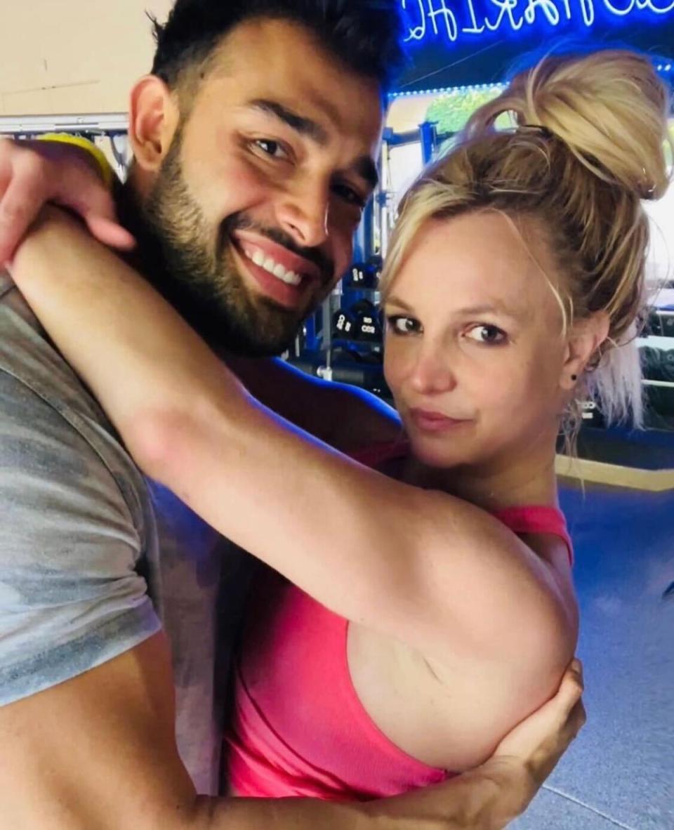 Sam Asghari and Britney Spears embrace in an Instagram post shared to the pop star’s social media account (Instagram/Britney Spears)