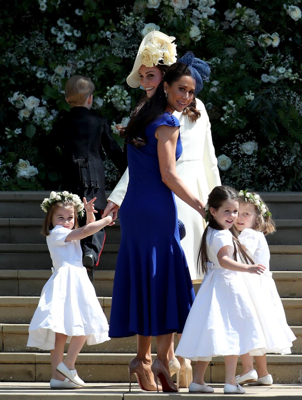 The Duchess of Cambridge with Princess Charlotte and other bridesmaids arrive at St George’s Chapel in Windsor Castle for the wedding of Prince Harry and Meghan Markle (Jane Barlow/PA) (PA Archive)