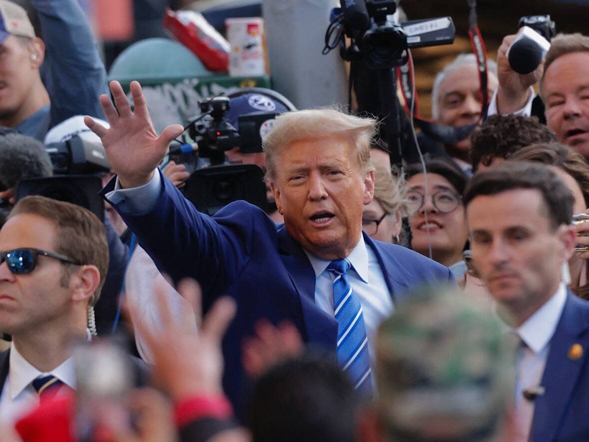 Former U.S. president Donald Trump after spending his second day of his trial for allegedly covering up hush money payments linked to an alleged extramarital affair, at the Manhattan Criminal Court in New York City on April 16. Seven jurors have now been appointed for the case, in a faster-than-expected process. Five members and several alternates are still needed. (Kena Betancur/AFP/Getty Images - image credit)