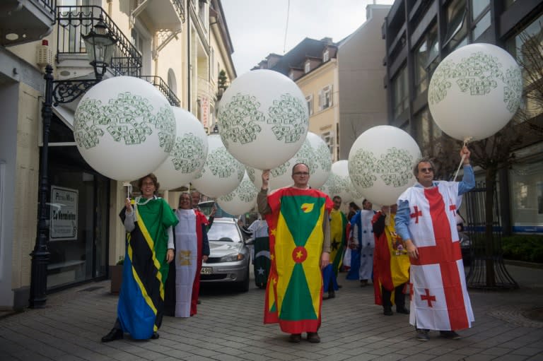 People rally calling for the cancellation of third world debts during the G20 Finance Ministers and Central Bank Governors Meeting in Baden-Baden, southern Germany