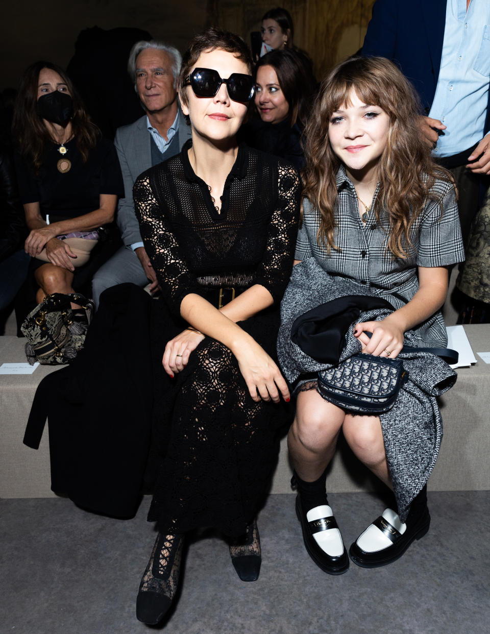 PARIS, FRANCE - SEPTEMBER 27: (EDITORIAL USE ONLY - For Non-Editorial use please seek approval from Fashion House) Maggie Gyllenhaal and Ramona Sarsgaard attend the Christian Dior Womenswear Spring/Summer 2023 show as part of Paris Fashion Week  on September 27, 2022 in Paris, France. (Photo by Victor Boyko/Getty Images)