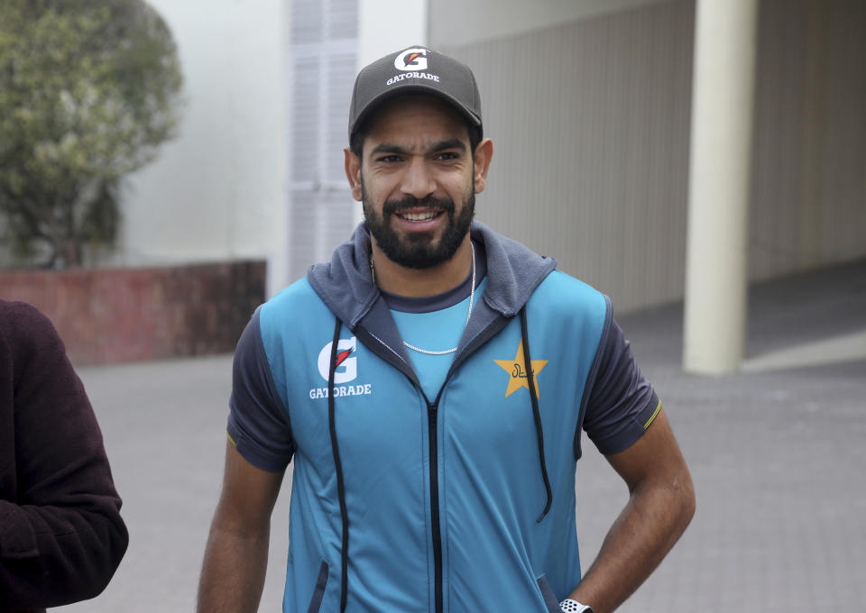 Pakistani cricketer Haris Rauf arrives to talk with media after a practice session in Lahore, Pakistan, Tuesday, Jan. 21, 2020. Pakistan's new pace sensation Rauf wants to play in all the three formats and hopes to carry his Big Bash League form into this week's Twenty20 series against Bangladesh at Lahore. (AP Photo/K.M. Chaudary)