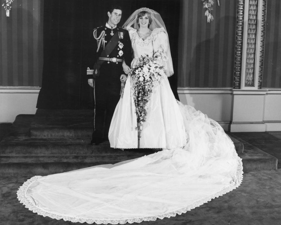 29th July 1981:  Charles, Prince of Wales and Diana, Princess of Wales (1961 - 1997) in the throne room of Buckingham Palace, after their wedding at St Paul's Cathedral, London.  (Photo by Keystone/Getty Images)