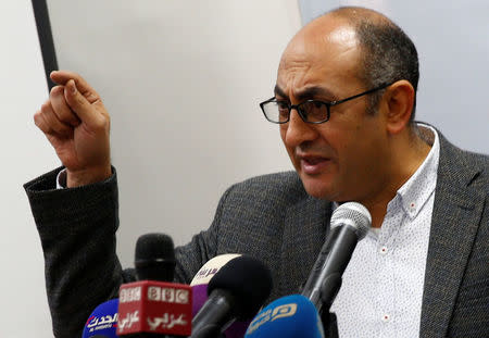 Egyptian human rights lawyer and opposition leader Khaled Ali gestures during a news conference about the upcoming 2018 presidential elections, in Cairo, Egypt January 17, 2018. Picture taken January 17, 2018. REUTERS/Amr Abdallah Dalsh