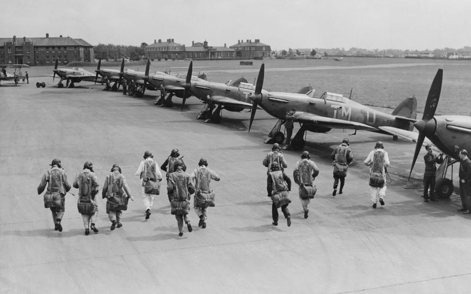 Pilots dash to their Hurricanes at RAF Northolt - Getty