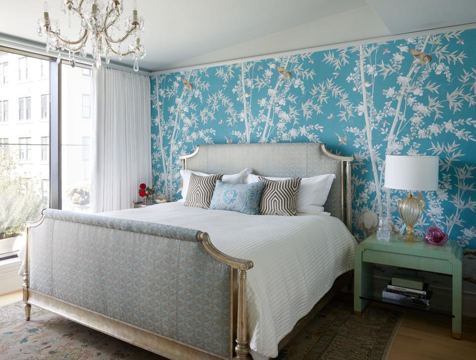 Miles Redd for Schumacher Brighton Pavilion wallpaper wraps the guest bedroom; the custom bed is upholstered in Fortuny fabric.