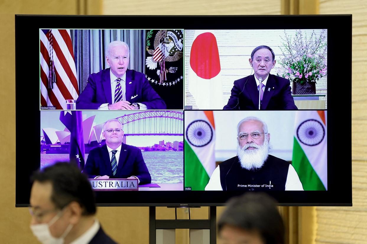 U.S. President Joe Biden (top L), Australia’s Prime Minister Scott Morrison (bottom L), Japan’s Prime Minister Yoshihide Suga (top R) and India’s Prime Minister Narendra Modi in a virtual meeting of the Quad (POOL/AFP via Getty Images)