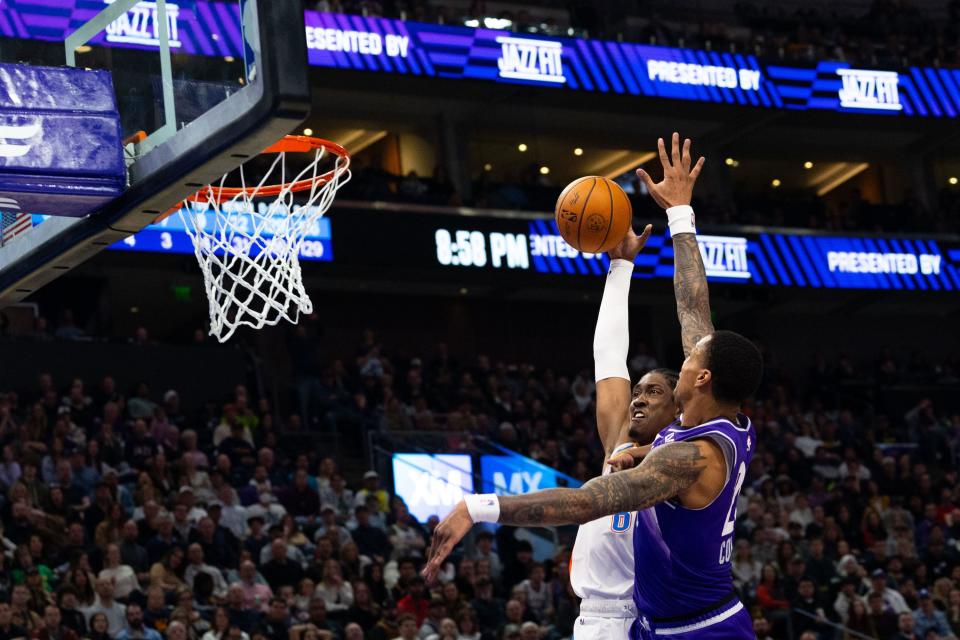 Oklahoma City Thunder forward Jalen Williams (8) shoots the ball with Utah Jazz forward John Collins (20) on defense during the NBA basketball game between the Utah Jazz and the Oklahoma City Thunder at the Delta Center in Salt Lake City on Thursday, Jan. 18, 2024. | Megan Nielsen, Deseret News