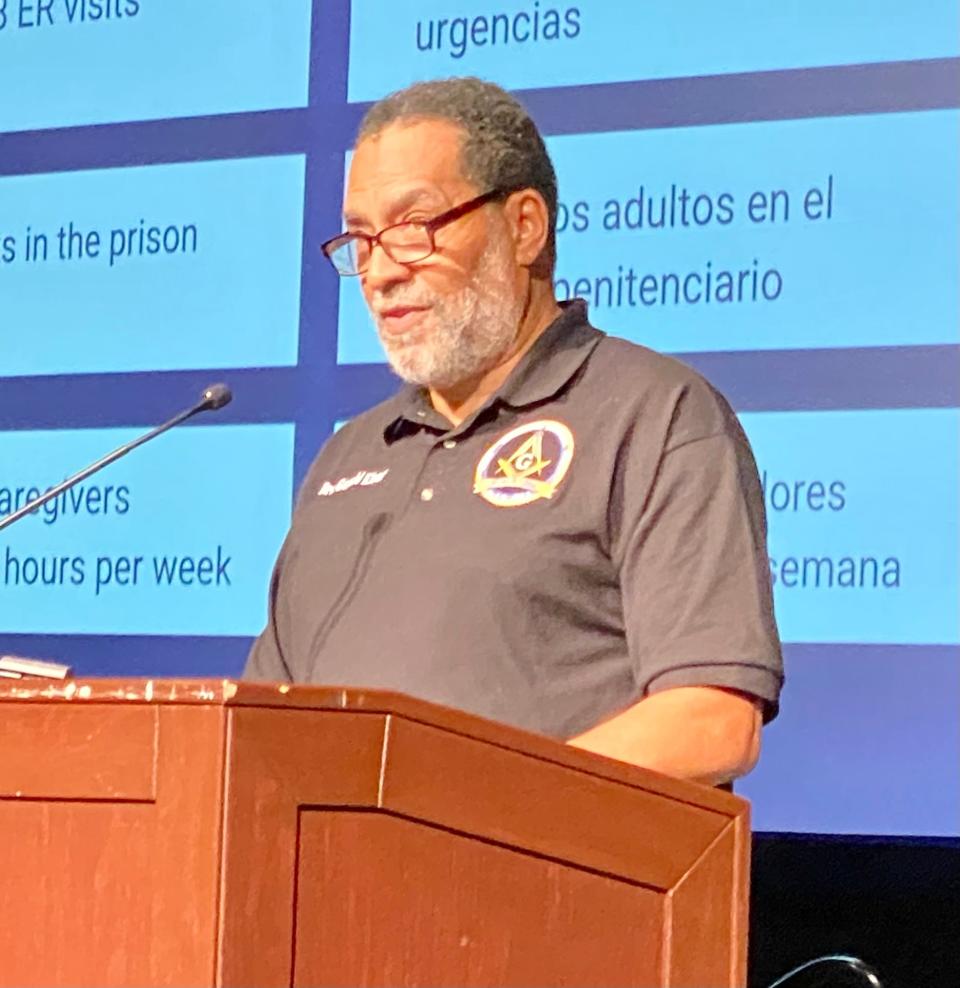 The Rev. Gerald Kisner of Tabernacle Missionary Baptist Church addresses PEACE's Nehemiah Action Assembly at the Palm Beach County Convention Center on Monday night.