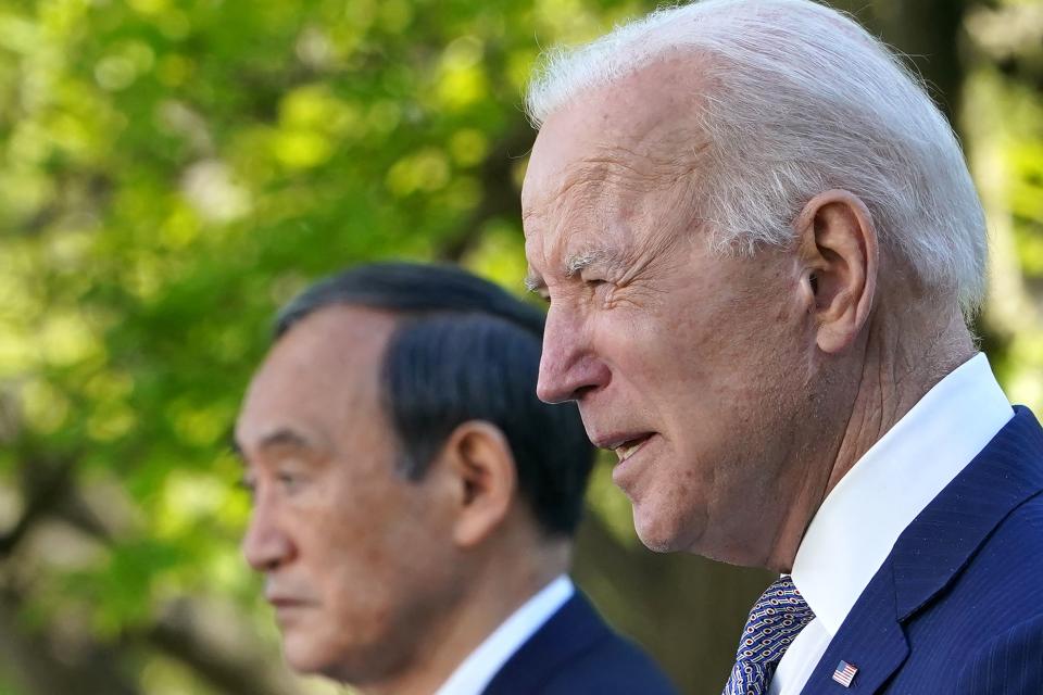 US President Joe Biden and Japan's Prime Minister Yoshihide Suga take part in a joint press conference in the Rose Garden of the White House in Washington, DC on April 16, 2021. (Photo by MANDEL NGAN / AFP) (Photo by MANDEL NGAN/AFP via Getty Images)