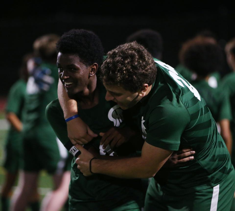 Spackenkill's, from left, Selamu Gendron and Vittorio Mazzarelli celebrate winning Thursday's Section 9 Class B semifinal versus O'Neill on October 26, 2023.