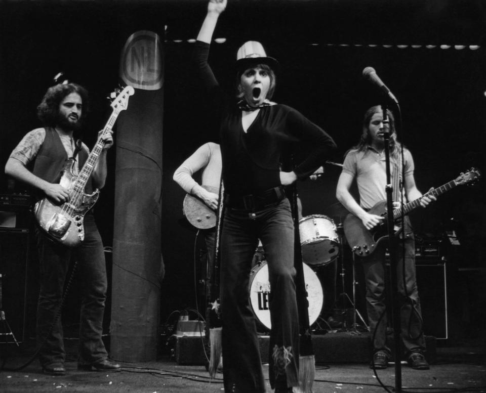 ‘National Lampoon’s Lemmings’ at New York’s Village Gate, with John Belushi on bass guitar and Alice Playten portraying Mick Jagger (1971) - Credit: GI