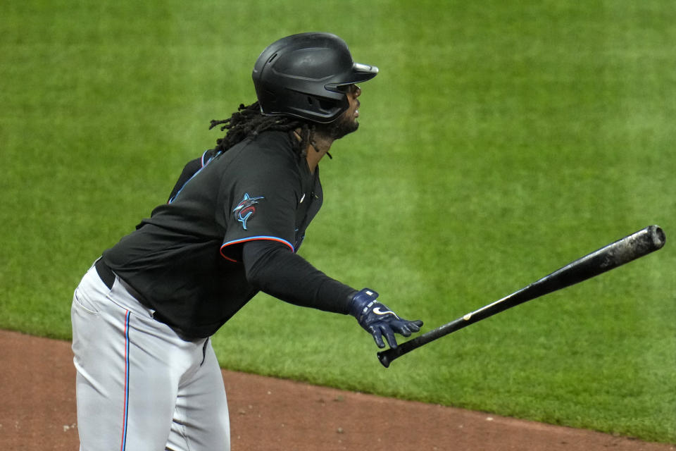 Miami Marlins' Josh Bell drives in two runs with a double of the right field wall off Pittsburgh Pirates relief pitcher Colin Selby during the eighth inning of a baseball game in Pittsburgh, Friday, Sept. 29, 2023. (AP Photo/Gene J. Puskar)