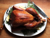 <p>Add a bit of richness with a bourbon and maple-glazed turkey, like <a rel="nofollow noopener" href="http://chocolateandmarrow.com/2014/12/09/bourbon-and-maple-glazed-turkey/" target="_blank" data-ylk="slk:this one from Brooke from Chocolate + Marrow" class="link ">this one from Brooke from Chocolate + Marrow</a>. She brines it first in a bath of bourbon, maple syrup, brown sugar, and spices then cooks in a smoker rather than roasting. [Photo: Instagram/brookebasspdx AKA Chocolate + Marrow] </p>