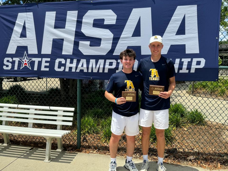 Tuscaloosa Academy's Jonni Kneer and Holman Bearden with their state championship trophies after winning the boys Class 1A-3A No. 1 doubles state championship on Friday