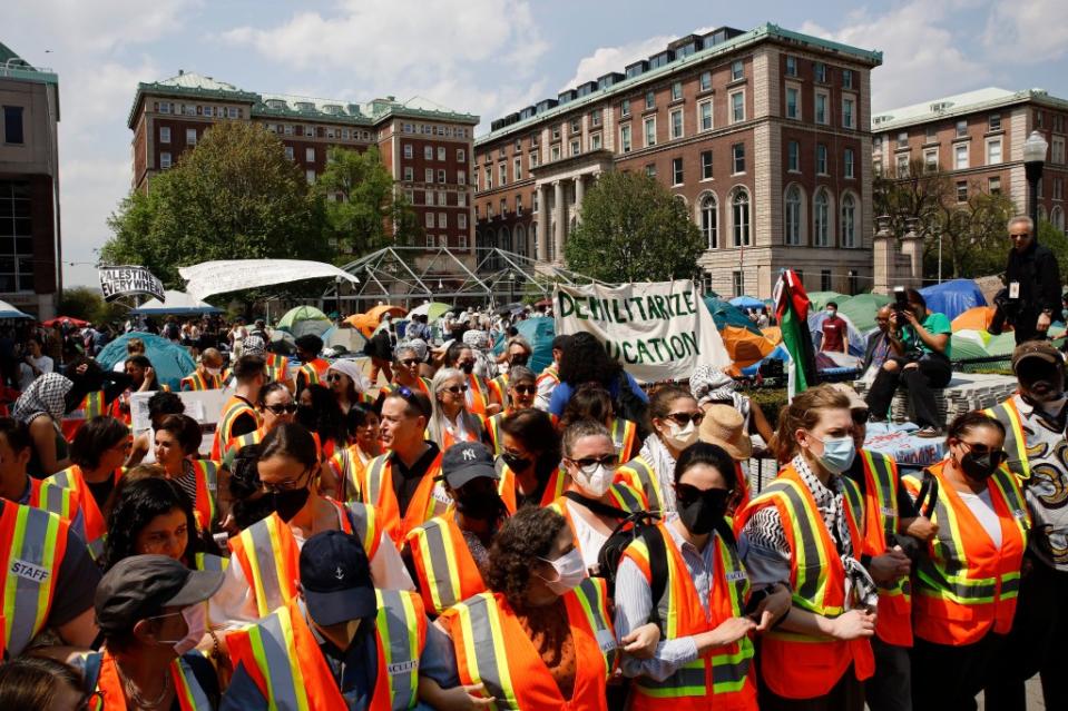 Columbia University faculty and staff gathered to support the students. AP Photo/Stefan Jeremiah