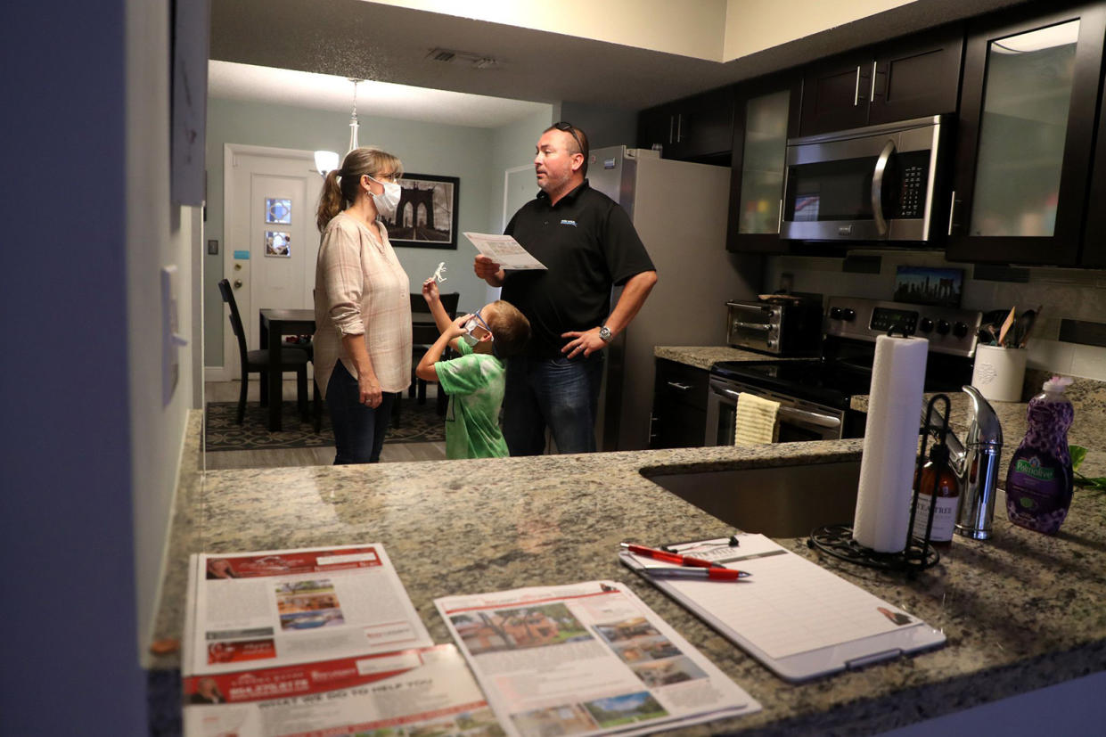 A buyer considers a new home during an open house in Plantation. (Credit: Carline Jean/Sun Sentinel/Tribune News Service via Getty Images)