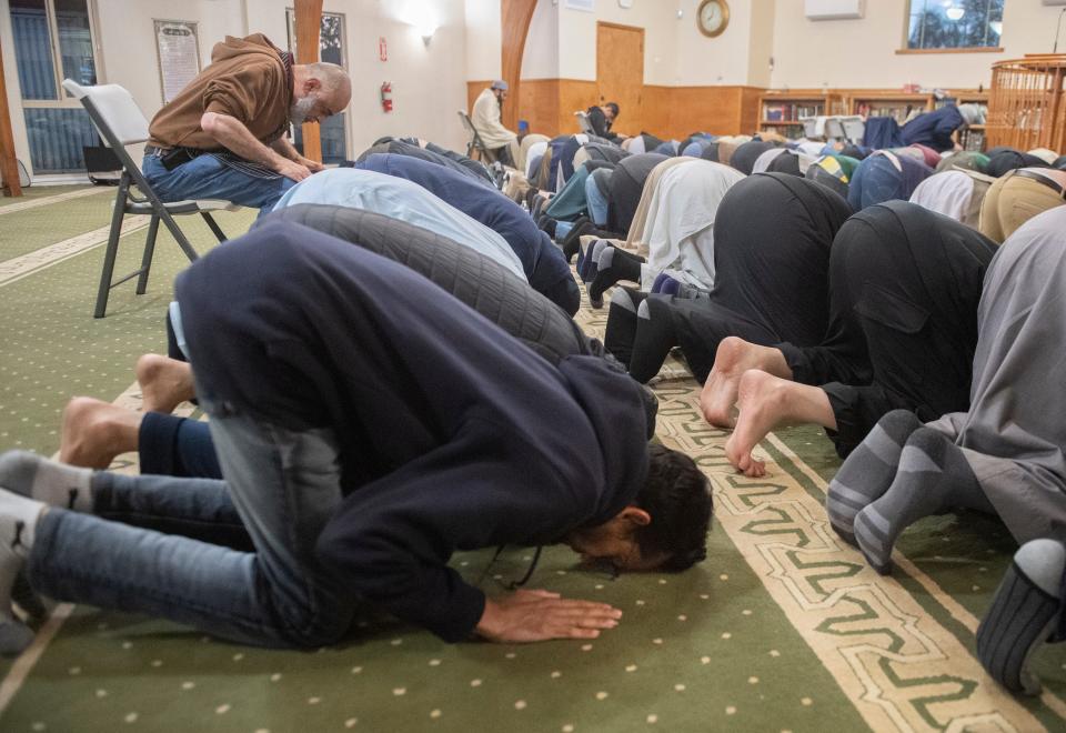 Congregation members participate in evening prayers during Ramadan at the  Masjid Al-Emaan mosque in Stockton on Tuesday, Apr. 18, 2023.