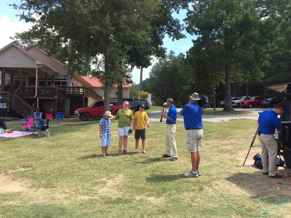 Chief Meteorologist Mike Buresh, his then teenage daughter, First Alert Certified Broadcast Meteorologist Garrett Bedenbaugh, and Action News Jax videographer Russ Pyne.