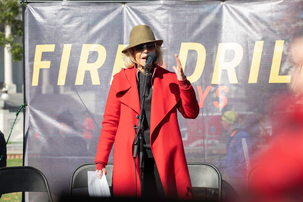 Jane Fonda says her iconic red coat will be the last item of clothing she ever buys [Photo: Getty]