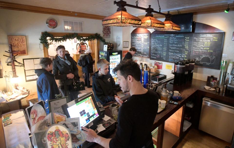 In this file photo, customers wait in line during the last day of business at Wild Boar Cafe in Fort Collins on Wednesday, Oct. 30, 2019. The business closed after 12 years.