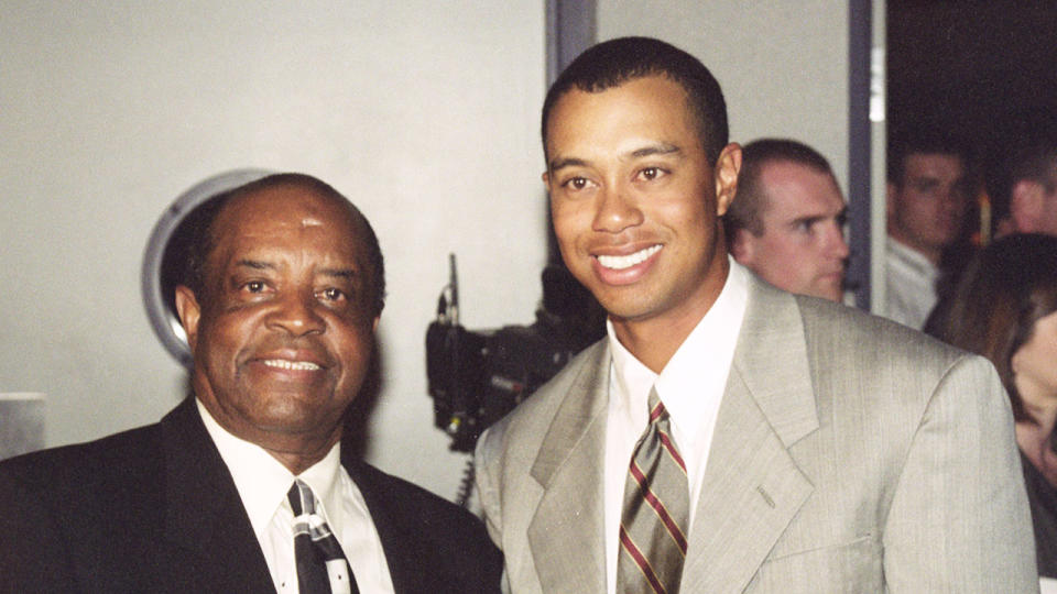 Lee Elder is pictured here with Tiger Woods earlier in their lives.