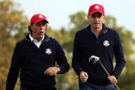 MEDINAH, IL - SEPTEMBER 28: Phil Mickelson and Keegan Bradley of the USA wait on a green during the Morning Foursome Matches for The 39th Ryder Cup at Medinah Country Club on September 28, 2012 in Medinah, Illinois. (Photo by Ross Kinnaird/Getty Images)