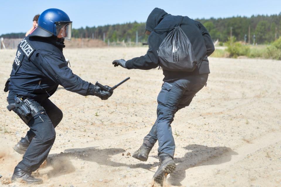 Some of the demonstrators have damaged a few Tesla cars using pyrotechnics and paint at a nearby car storage site, authorities said. ZUMAPRESS.com