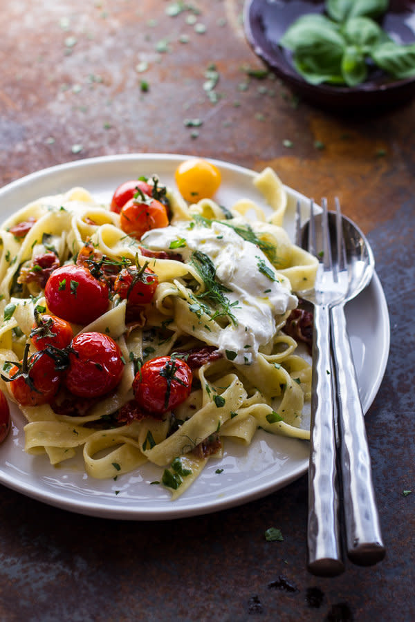 <strong>Get the <a href="http://www.halfbakedharvest.com/garlic-herb-roasted-cherry-tomato-carbonara-wcrispy-prosciutto-burrata/" target="_blank">Garlic and Herb Roasted Cherry Tomato Carbonara with Crispy Prosciutto and Burrata recipe</a> from Half Baked Harvest</strong>