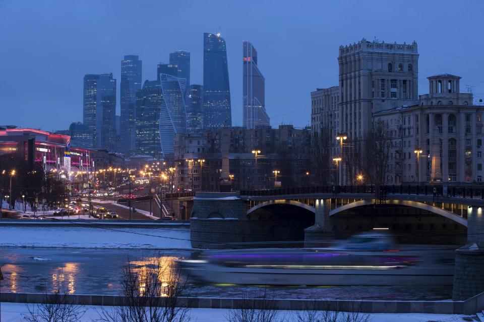 In this Monday, Feb. 13, 2017 photo, skyscrapers of the Moscow City development rise above the capital in Moscow, Russia. For an Associated Press correspondent returning to the Russian capital on an extended assignment for the first time sincethe early 1990s, the city holds many new landmarks, but some sights remain unchanged as well. (AP Photo/Alexander Zemlianichenko)