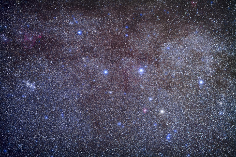 The constellation of Cassiopeia the Queen, framed with the 85mm lens and including many star clusters: M52 at right, the Double Cluster at left, and M103 and NGC 457 on the left side of the W of five stars that marks Cassiopeia. The Heart Nebula, IC 1805, is at upper left, and the Pacman Nebula, NGC 281, is at lower centre.