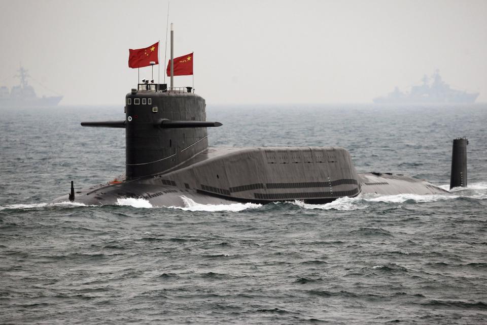 Chinese Navy nuclear-powered submarine sails during an international fleet review